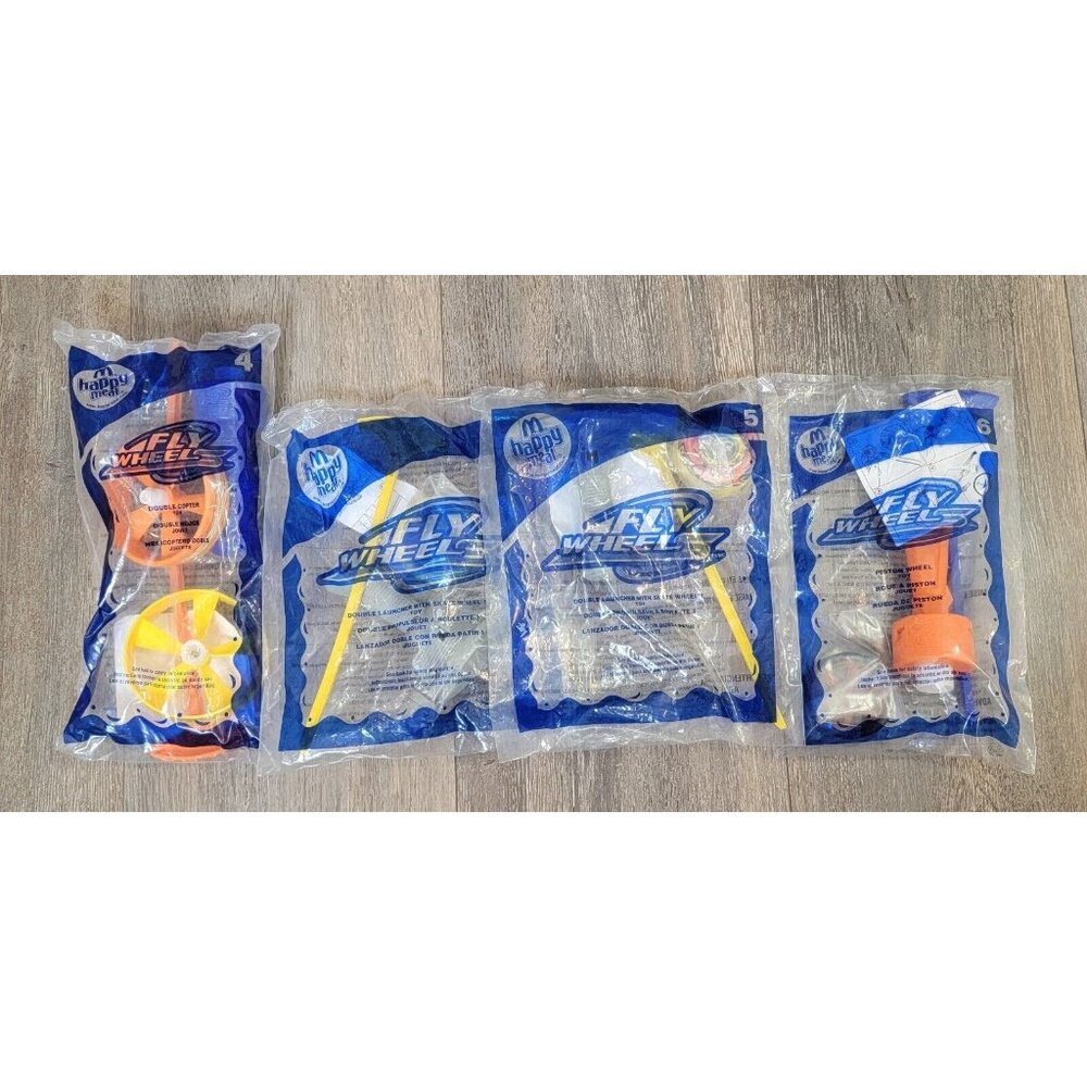 2007 McDonalds Fly Wheel Happy Meal Toys #4 #5 #6 LOT OF 4 SEALED